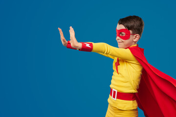 Fototapeta na wymiar Superhero kid using superpower