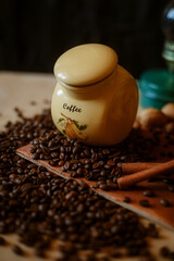 a can of coffee standing on coffee beans vertical