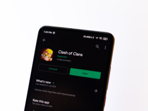Assam, india - October 11, 2020 : Clash of clan logo on phone screen stock image.
