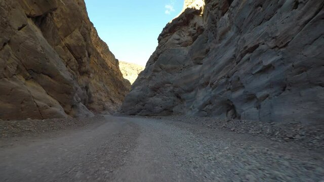 Low Angle Of Curvy Titus Canyon Road In Death Valley