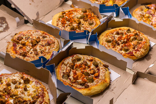 West Bangal, India - August 21, 2021 : Dominos pizza on box stock image.
