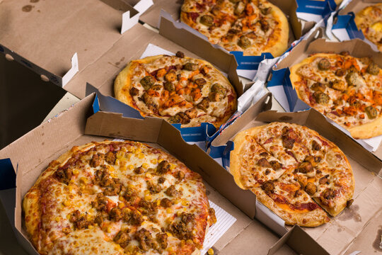 West Bangal, India - August 21, 2021 : Dominos pizza on box stock image.
