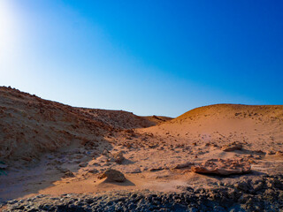 Fototapeta na wymiar Beautiful Egyptian desert. Blue sky and sand. Marsa Alam