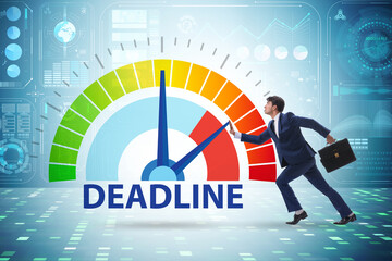 Businessman in deadline and time management concept