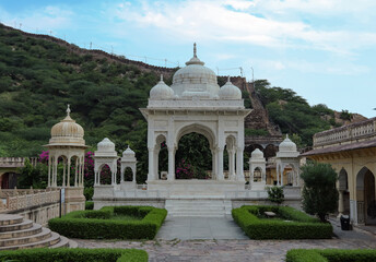 Fototapeta na wymiar Amazing view of memorial grounds to Maharaja Sawai Mansingh II and family constructed of marble. Gatore Ki Chhatriyan, Jaipur, Rajasthan, India.