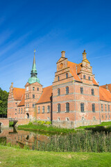 Fototapeta na wymiar Historic castle surrounded by water in Rosenholm, Denmark