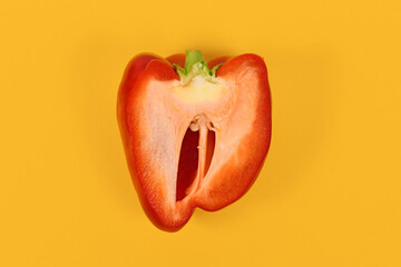 Red bell pepper cat open on yellow background