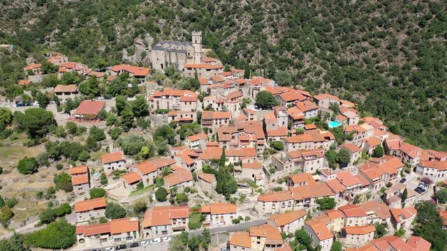 Panoramic view from above on the city Eus. Small town located on high mountain. Eastern Pyrenees. France. High quality 4k footage