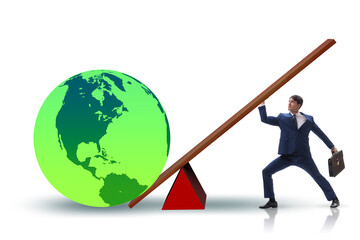 Businessman lifting the earth in challenge concept