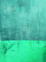 beautiful background of old solid metal garage wall painted with green paint