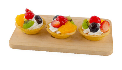 A delicious fruit tart made with strawberries,grapes and kiwi