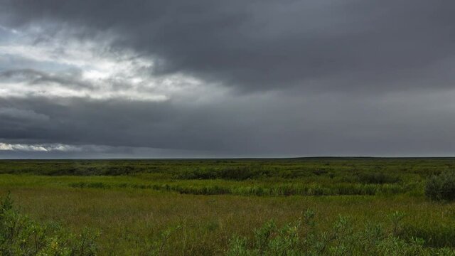 Time lapse footage about cloudy day in the north in tundra