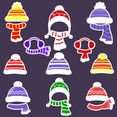 A set of nineteen different stickers for hats and scarves in white outline. Clothes for winter and autumn. Flat style vector