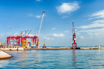 Harbour Port with Loading Cranes in Lisbon City in Portugal.