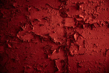 fond ou texture d'arrière-plan abstrait de couleur rouge bordeaux d'un mur défraîchi de peinture craquelée