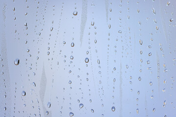 drops glass blue background abstract, transparent cold background water splashes