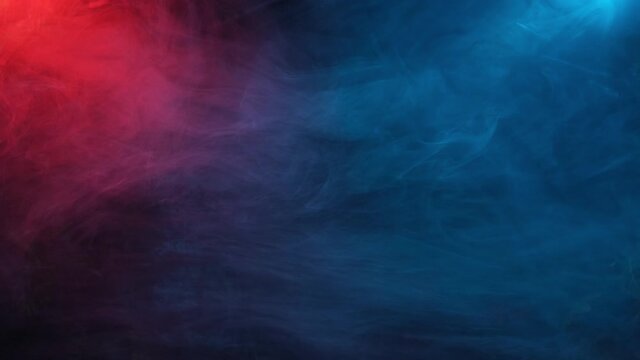 Colored smoke on a dark background. Blue and red light with smoke.