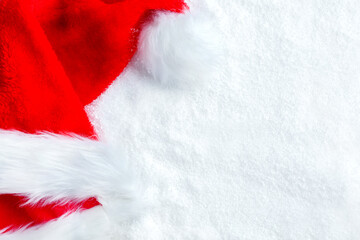 Red Hat, Santa Claus hat in the snow. Christmas concept, winter