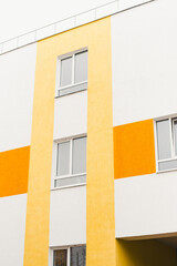 Bright house against the sky. Roof of the house. New building. Colored house. 