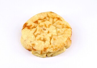 Frico ready to cook on white background. It is a traditional dish of the autonomous italian region of Friuli, consisting mainly of heated cheese and potatoes.