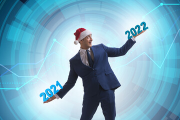 Businessman with new year 2021 to 2022