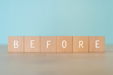 「BEFORE」と書かれた積み木