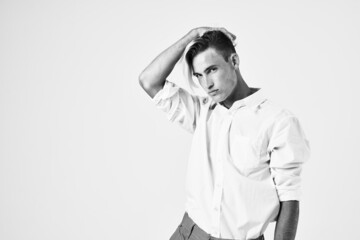 attractive man in white shirt trendy hairstyle self confidence fashion lifestyle