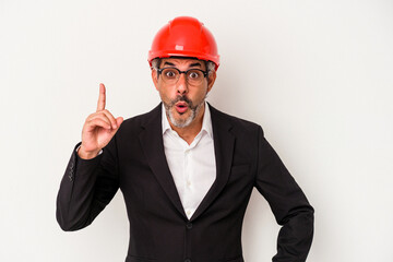 Middle age architect caucasian man isolated on white background  having an idea, inspiration concept.