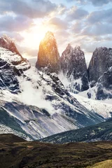 Poster Im Rahmen Torres del Paine peaks coming from clouds at sunset times © Fyle