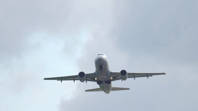 Airplane flies overhead