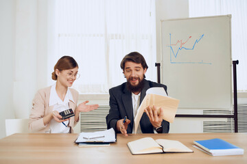 Fototapeta premium work colleagues in the office professional's desk communication