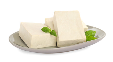 Plate with delicious raw tofu and basil isolated on white