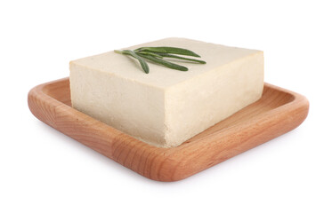 Wooden plate with delicious raw tofu and rosemary isolated on white
