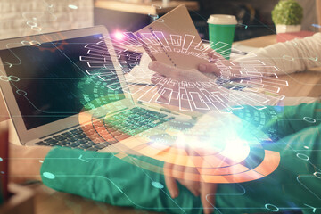 Double exposure of man and woman working together and technology theme drawing hologram. Big data concept. Computer background.