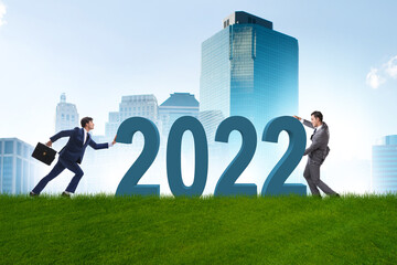 Concept of new year of 2022 with business people