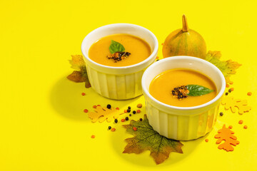 Vegetable cream soup. Traditional autumn composition. Healthy hot food, spices, foliage