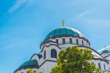 Fototapeta na wymiar Top view of Saint Sava christian catedral with blue cloudy sky in the capital Belgrade of Serbia
