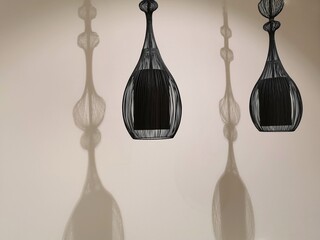 play of light and shadow with 2 chandeliers