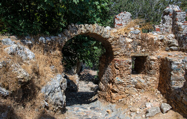 Fototapeta na wymiar Ancient stone arch passage on the territory of the fortress in Alanya