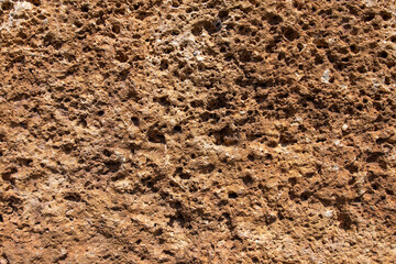Texture of a stone wall. Old antique stone wall texture background.