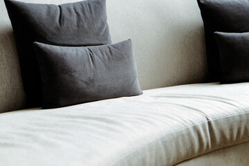 Fototapeta na wymiar Detail image of cushion on sofa, modern living room.