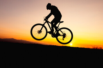 Fototapeta na wymiar bike stunts and frantic rides of a talented person