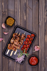 Meat kebab with vegetables and spices