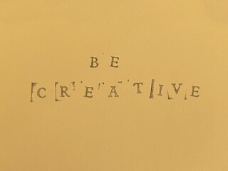 Photograph of letters stamped in black ink, rustic image, colors background, traditional typewriter typography. Ideal for creating posts for your social networks and blog.