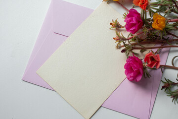 invitation card mockup with purslane flowers.
 plants withpink flowers. 
