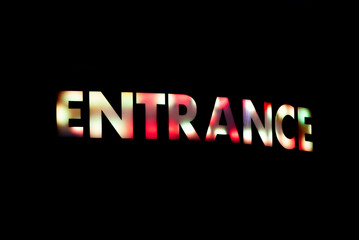 Colorful neon sign of entrance