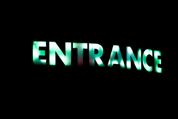 Colorful neon sign of entrance