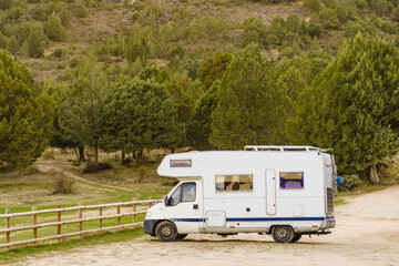 Rv camper camping in mountains, Spain.