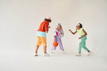 Child basketball players on a white background during the game