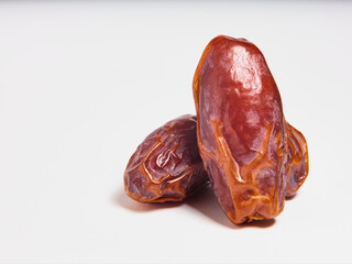 Fresh Medjool dry Dates isolated on white background